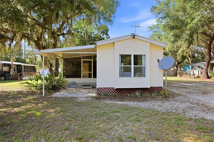 Unlock the potential of this rare Lake Wales opportunity featuring two separate homes on a spacious half-acre lot — perfect for multi-generational living, rental income, or a private guest retreat. The main residence offers 2 bedrooms, 2 bathrooms, 784 square feet, a desirable split-bedroom layout, and a cozy fireplace that adds warmth and character. The second home includes 2 bedrooms, 1 bathroom, and 616 square feet, creating endless flexibility for investors, seasonal residents, or extended family. Both homes come fully furnished for an effortless transition. Surrounded by lush, established landscaping and complete with a detached garage, this property offers the freedom of NO HOA and NO CDD fees. Ideally located just minutes from the 4,500-acre Lake Rosalie — renowned for world-class bass fishing — this is a unique chance to enjoy the best of Florida living with built-in versatility and income potential. Opportunities like this are hard to find — schedule your private showing today and come experience the possibilities for yourself!