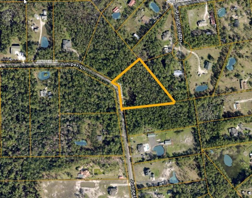 Discover the perfect blend of privacy and location with this beautiful 2.64-acre lot in the heart of Ormond Beach! Tucked away on a quiet street in a desirable area, 402 Juniper Lane offers a rare opportunity to build your dream home surrounded by mature trees and natural Florida beauty. With ample space for a custom estate, pool, guest house, or workshop, this oversized parcel provides endless possibilities. Enjoy the peaceful setting without sacrificing convenience—just minutes from shopping, dining, schools, and I-95. No HOA and plenty of room for boats, RVs, or recreational toys. A truly unique property in an established neighborhood—don’t miss your chance to create your private retreat in one of Ormond Beach’s most sought-after locations!