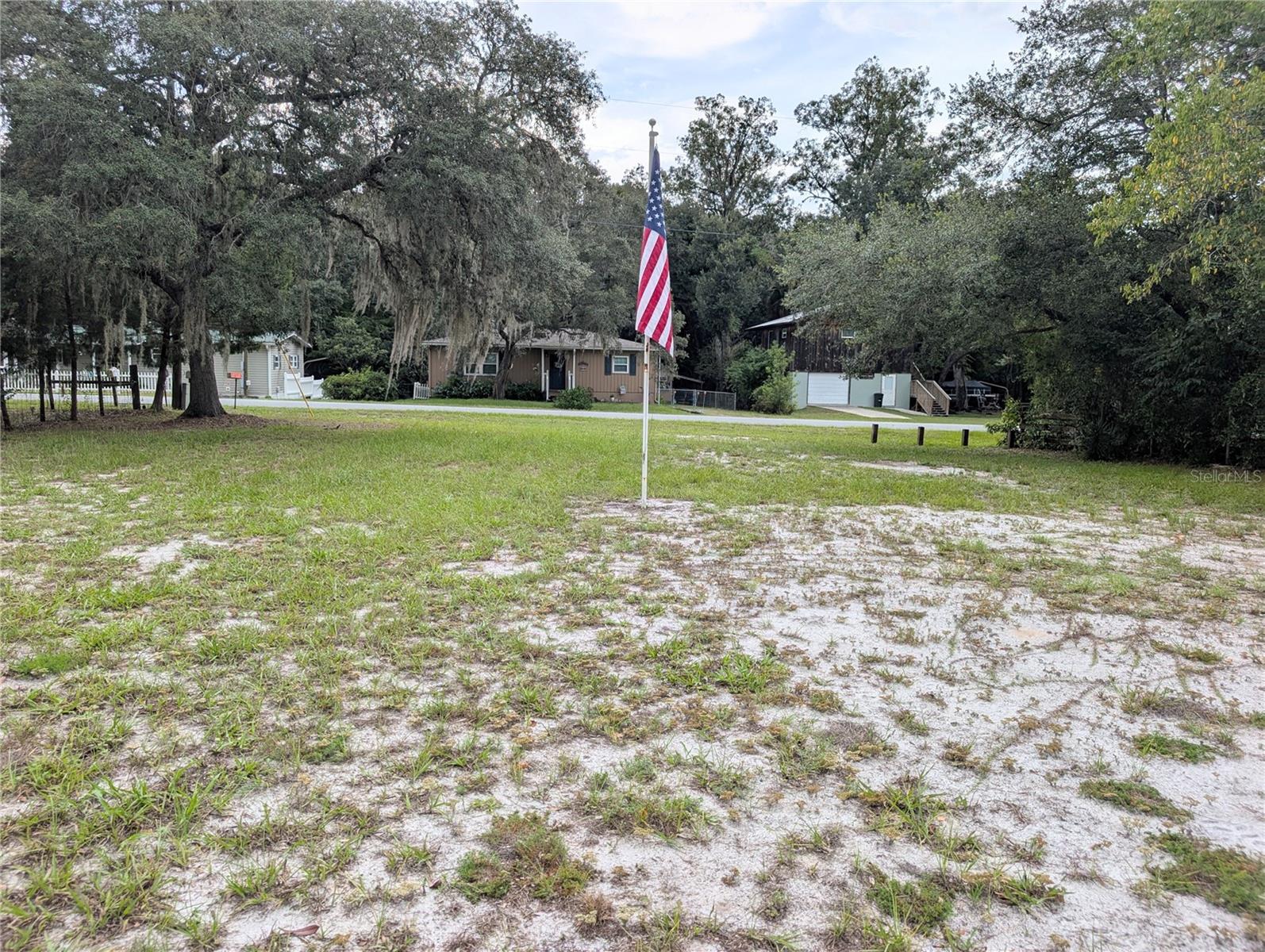 3 BEDROOMS, 2 BATH ON 2 LOTS .43 OF AN ACRE. GREAT LOCATION. NEAR DUNNELLON, OCALA AND CRYSTAL RIVER. PUBLIC BOAT RAMP CLOSE BY. THIS LARGE LOT .43 OF AN ACRE. (2 LOTS) ** ROOM FOR ALL THE TOYS AND THE IN-LAWS ALSO! For Equestrians, you are 15 minutes from Ross Prairie Trailhead and 35 minutes to the World Equestrian Center. You are also 15 minutes to downtown Dunnellon, 20 minutes to the Rainbow River for swimming, tubing, kayaking, and boating. 20-25 minutes to Ocala for restaurants and shopping. Near THE SHOPPES at BLACKDIAMOND, check out this home located near the Withlacoochee River. carport, shed w/electric & water-workshop, 2 lots go street to street. Living room, formal dining room, HUGE kitchen opens to family room which leads to screen porch and wood deck. Large Master bedroom suite. Inside laundry. New A/C and roof 2010. A/C unit is a 4-ton unit new. YOU DON'T WANT TO MISS THIS ONE! GREAT LOCATION. NEAR DUNNELLON, OCALA AND CRYSTAL RIVER. PUBLIC BOAT RAMP CLOSE BY. THIS LARGE LOT .43 OF AN