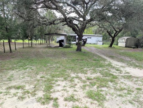 Photo of 4140 E Riverside Drive, Dunnellon, FL 34434 (MLS # OM707307)