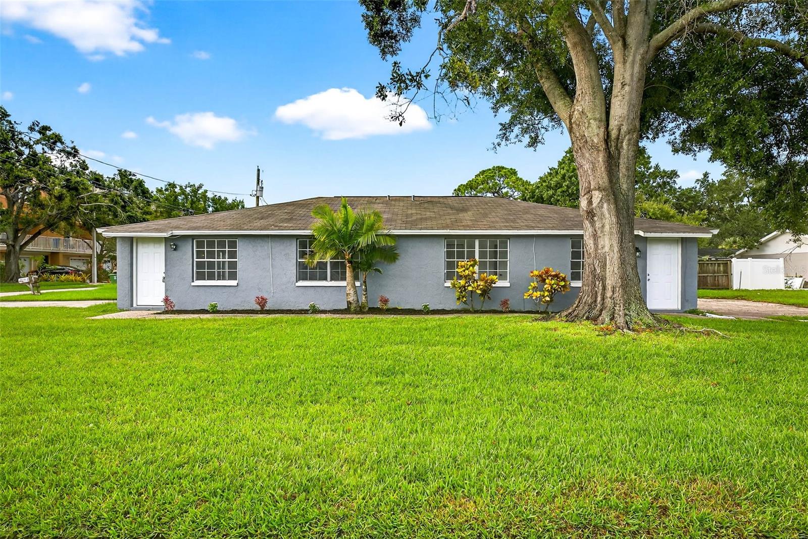 One or more photo(s) has been virtually staged. Welcome to 6801 S Faul St, a beautifully remodeled duplex-style home offering stylish comfort and versatility in one of Tampa’s most sought-after neighborhoods. Perfect spot for a vacation rental, short term and Airbnb allowed. OR get great terms with an FHA loan and live in half and rent the other to help get your mortgage paid for. With fresh paint, new floors, updated lighting, modern kitchens, and remodeled bathrooms, both units are move-in ready—perfect for today’s lifestyle. Duplex A (2 Bed | 1.5 Bath) features an open floor plan with a bright kitchen, breakfast bar, new stainless steel appliances, and a cozy breakfast nook with French doors that open to your private yard—ideal for enjoying fresh air or letting your small pet out. A laundry/utility room adds everyday convenience with its own exterior door to the yard. The spacious primary bedroom includes a built-in closet and updated full bath, while a second bedroom and nearby half bath complete the layout. Duplex B (2 Bed | 1 Bath) mirrors the same modern design with an open living area, upgraded kitchen, and two comfortable bedrooms with a stylish full bath. Live in one side and lease the other, with separate entrances, private outdoor space, and move-in ready condition, this duplex is ideal for attracting long-term tenants or short-term rental opportunities. The South Tampa rental market remains in high demand, with proximity to MacDill AFB, Bayshore Blvd, Downtown Tampa, Hyde Park, and the Westshore business district. Schedule your showing today!