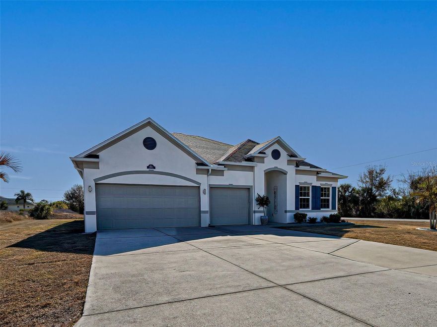 4 bedroom, 3 bathroom home featuring TWO full en suite bedrooms plus a den, offering nearly 2,700 square feet of spacious, well designed living space. This home feels massive from the moment you walk in.

Priced to sell and move in ready, this beautifully maintained 2016 built home includes a 3 car garage and sits on an oversized corner lot along a freshwater canal in highly sought after South Gulf Cove.

Inside, the open layout is bright and inviting with volume ceilings, crown molding, and seamless flow from the kitchen through the dining area and expansive family room. Large 8 foot sliders frame tranquil pool views and flood the home with natural light, making everyday living and entertaining effortless.

The kitchen is both functional and stylish, featuring new granite countertops, staggered cabinetry, a raised breakfast bar, a generous pantry, and plenty of space to gather whether hosting friends or enjoying a quiet morning coffee. The family room remains connected to the outdoor living space, perfectly suited for Florida’s indoor outdoor lifestyle.

The primary suite is spacious and inviting with a tray ceiling and multiple windows that allow natural light to pour in. The en suite bath offers dual vanities, a garden tub, a glass enclosed shower, and a large walk in closet. Two guest bedrooms share a hallway bath for added privacy, while the second en suite bedroom provides an ideal setup for guests or an in law suite.

Step outside and enjoy a private outdoor retreat. The covered, pavered lanai offers plenty of room for dining, entertaining, or relaxing out of the sun. The sparkling Pebble Tec pool features a sundeck and bubbler, along with a dedicated sunbathing area, making it perfect for hot Florida days.

Additional highlights include a new pool pump in 2022, storm shutters, an oversized lot, and a prime location close to beaches, golf courses, and local dining. This home truly checks every box and is a must see. Schedule your showing today.