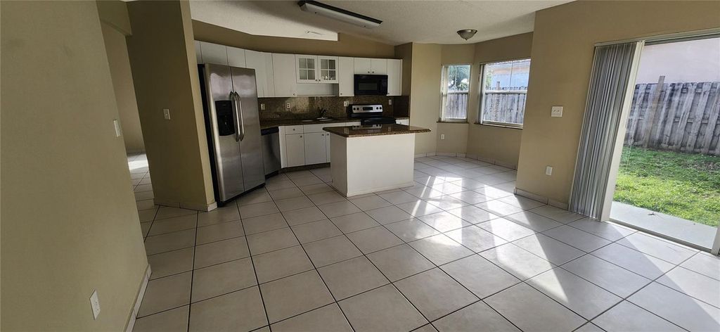 Photo of 14310 SW 9th Terrace, Miami, FL 33184 (MLS # O6366991)