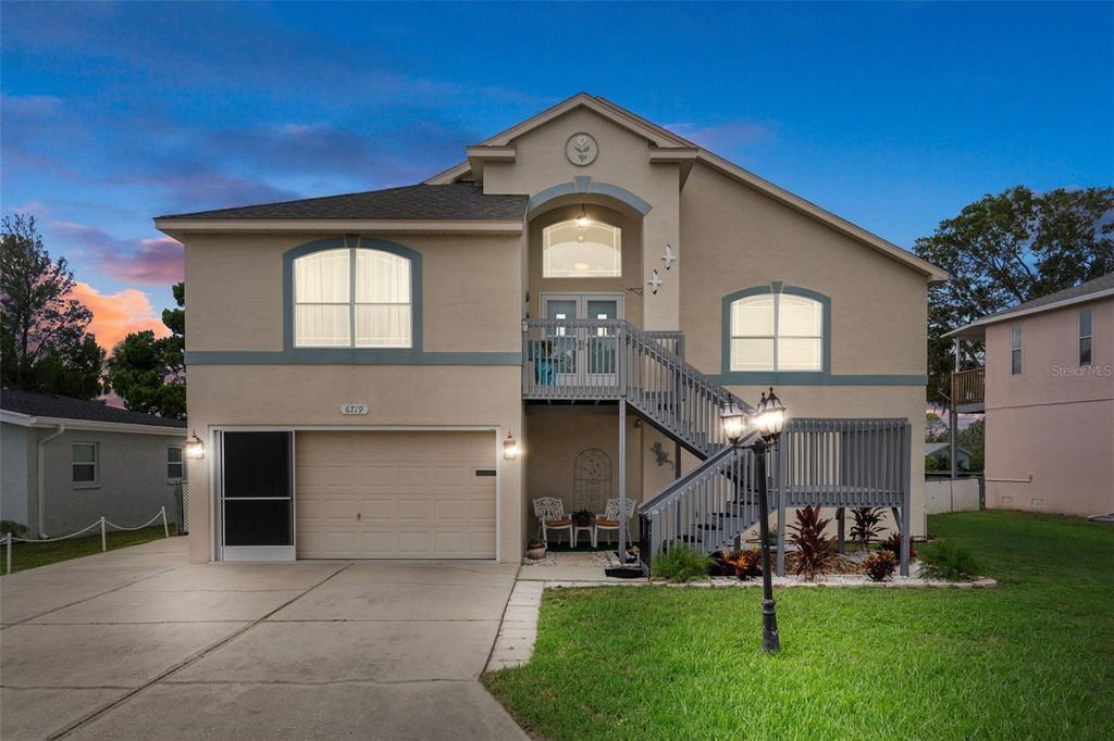 Photo of 6719 Manor Beach Road, New Port Richey, FL 34652 (MLS # TB8436343)