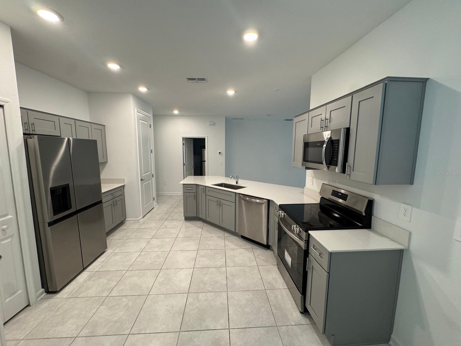 Great opportunity! This single family with an attached apartment, 4 bedrooms, 3 baths and a two car garage. There is a separate entrance for a Next Gen with all appliances, Bedroom, living room and kitchenette, giving the sense of privacy and independence within proximity. This tranquil community provides quality block construction, innovative designs, with brand-new appliances. All homes come standard with Connected Home features. There will be a community pool, cabana, playground, and sports courts. Conveniently located near shopping, restaurants, parks, schools, and close proximity to major roadways. NO PETS!the property could be rented separe, 1 house 3Bed 2 bath, 2 car garage $1950 and the attached apartment 1 Bed, 1 bath, kitchen, laundry room, living room $1000