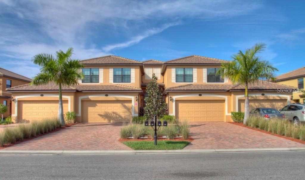 Beautifully furnished 3 bedroom 2 bath coach home in the resort style community of River Strand! Relax on the spacious lanai overlooking the championship golf course. Wood Cabinets, Stainless Appliances, Granite Counters. Master Bedroom has a King Bed, walk in closet, shower and garden tub in spacious master bath. Twins in one bedroom and one fold out Twin in 3rd Bedroom. River Strand is AMENITY RICH with 27 holes of Arthur Hills designed golf, a full restaurant and grille room, 2 resort pools and spas, 6 satellite pools, tiki bar, 2 fitness centers, tennis and pickle ball courts and social activities all year long! Perfectly located close to I-75, and the beautiful beaches of the Gulf Coast. Come and experience River Strand at it's best, you may never want to leave! Easy commute to world class beaches, Sarasota and Bradenton. AVAILABLE 2026 SEASON 3 MONTH MINIMUM $6500 MONTH, SORRY NO PETS ALLOWED