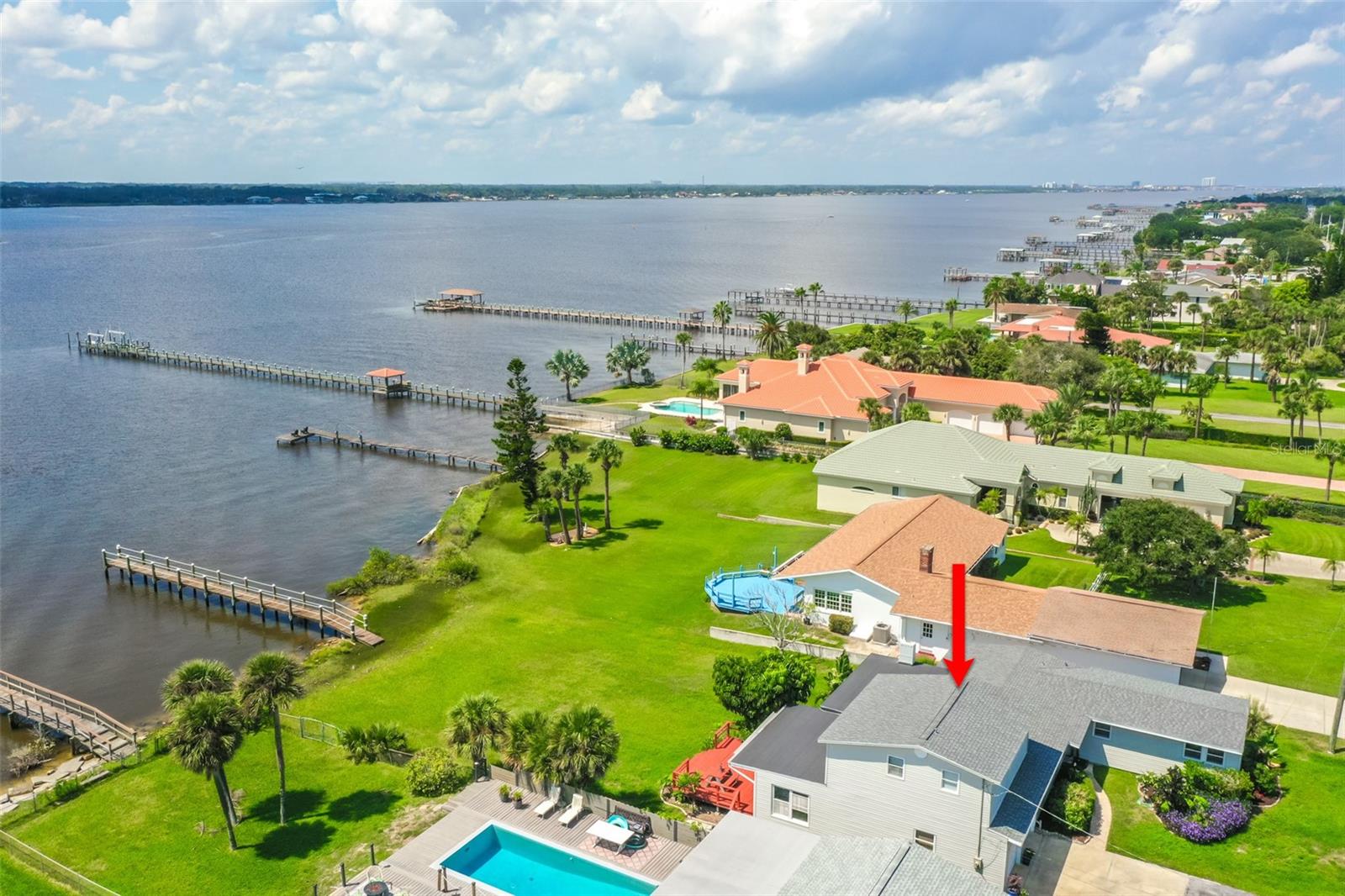 SELLER WILL PAY UP TO $25,000 TOWARDS BUYER'S CLOSING COSTS, POINTS AND PRE-PAIDS. Great price for DIRECT WATERFRONT with DOCK. Welcome to your charming getaway or permanent home, where old Florida style meets modern comfort. A few of the original features are the beautiful beamed ceilings, classic tiled bathrooms and gleaming hardwood floors. Two master suites - one up and one down. Just minutes from the beach, famous dining spots, unique shopping locations, and the State's tallest lighthouse and museum. This spacious family home offers the perfect balance of relaxation and adventure. With plenty of room for family and friends, the home features expansive living areas and cozy nooks, ideal for gathering together or enjoying quiet moments by the water. Whether fishing off the dock, lounging on the deck, or exploring the nearby attractions, this home is the perfect setting for making unforgettable memories.
Some of the updates include roof in 2022, new electric panel, PEX plumbing, one newer A/C unit, one brand new A/C unit; all new ductwork; sprinklers & granite in the kitchen. Termite Bond included.
