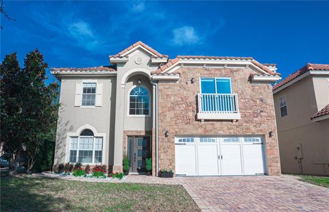 Photo of 7035 Brescia Way, Orlando, FL 32819 (MLS # TB8484363)