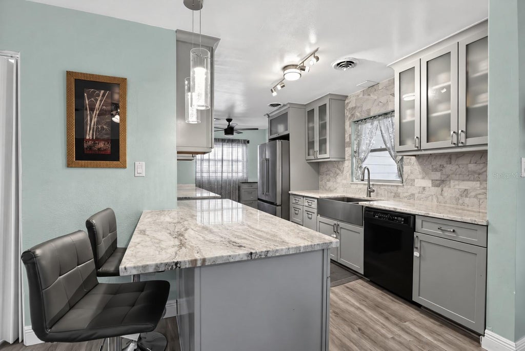 Photo of 603 Carnation Drive, Winter Park, FL 32792 (MLS # TB8561386)