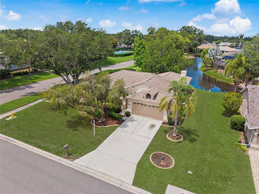 One or more photo(s) has been virtually staged. Charming Family Home on a Corner Lot with Pond View
Welcome to this inviting 3-bedroom, 2-bath home offering both comfort and versatility. Located on a desirable corner lot, this residence features a spacious living room and separate family room, ideal for entertaining or relaxing. The eat-in kitchen and formal dining room provide flexible dining options for gatherings of any size.
Enjoy cozy evenings by the fireplace, or step out to the screened lanai with a convenient pet door, perfect for enjoying the tranquil pond view and Florida’s beautiful weather. A 2-car garage provides ample parking and storage. Residents will also enjoy access to the nearby community pool, adding to the home’s appeal and lifestyle convenience.
Ideally located close to shopping, dining, and other everyday amenities, this home blends functionality with charm—perfect for families or anyone seeking a peaceful setting with room to grow.