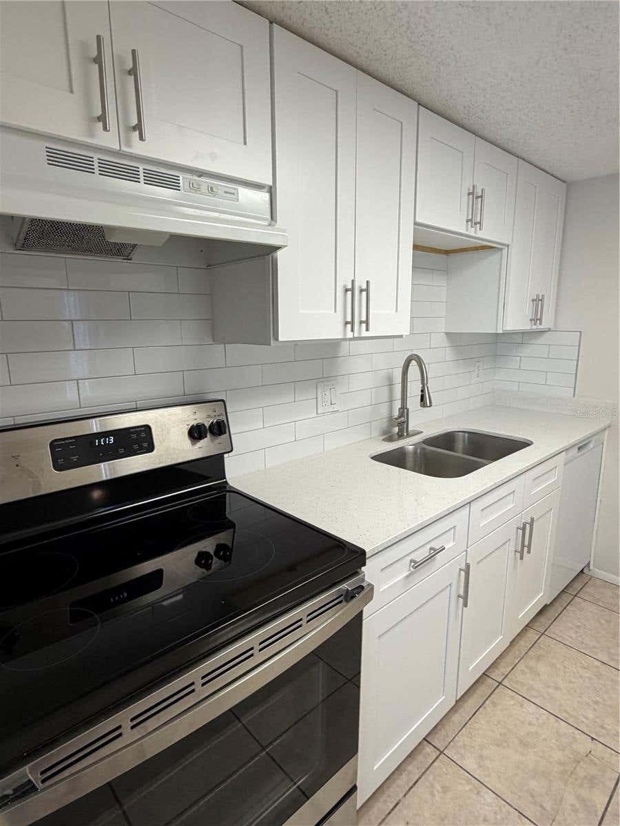 Photo of 4911 Silver Oaks Village #F, Orlando, FL 32808 (MLS # O6428694)