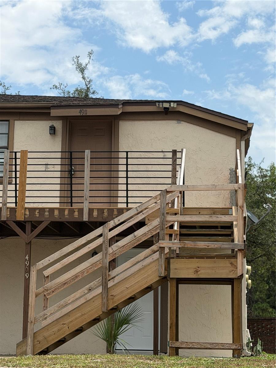 Photo of 4911 Silver Oaks Village #F, Orlando, FL 32808 (MLS # O6428694)