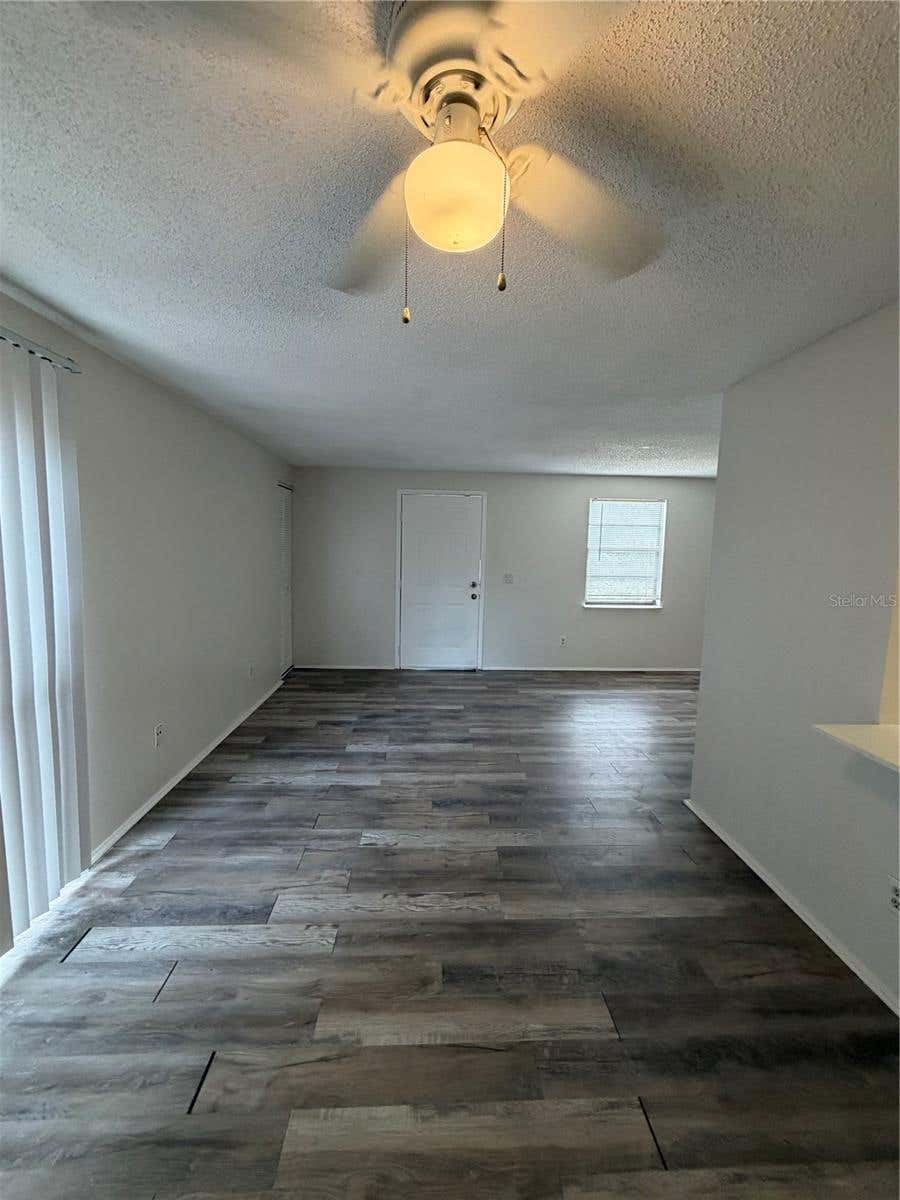 Photo of 4911 Silver Oaks Village #F, Orlando, FL 32808 (MLS # O6428694)