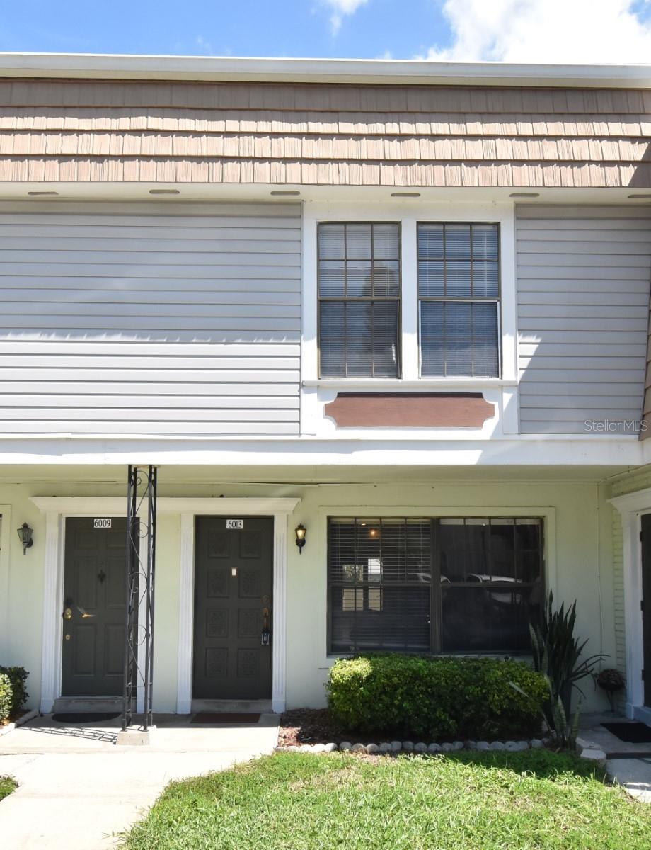 PRICED TO SELL, 3 Bedroom, 2 1/2 Baths, 1,388 sq. ft. 2 Story Condo with a 1 car reserved parking space just a few steps from the front door. One of the largest units in the community, there is a spacious (14' x 8') rear porch with windows & backyard access door which is not included in the "living" square footage. The family room contains crown molding, is large, airy, bright & separated for maximum seating, comfort & seclusion. Open & roomy dining area off the kitchen is perfect for informal gatherings with plenty of space to add an island. The downstairs 1/2 bath has been tastefully remodeled. There are 2 storage access points under the stairs as well as a closet on the porch. All bedrooms are spacious & located upstairs. Secondary bedrooms each have double closets, and will comfortably fit full size beds with plenty of supplemental space for furniture. Primary is huge(18' x12') with crown molding, oversized (5'x4') renovated shower including a built-in bench & a spacious (8'x5') walk-in closet for all the wardrobe essentials. ALL Appliances including a Washer/Dryer. Newer (2024), Hot Water Heater & A/C (2020). Community pool, LOW HOA fees INCLUDES Water & Garbage. Community Entry/Exit access located on a "no outlet" street for quiet & safety, near OIA, 408, Beach Line & 417 for easy access throughout central Florida. This unit is a real value, seize the opportunity before it is gone!
