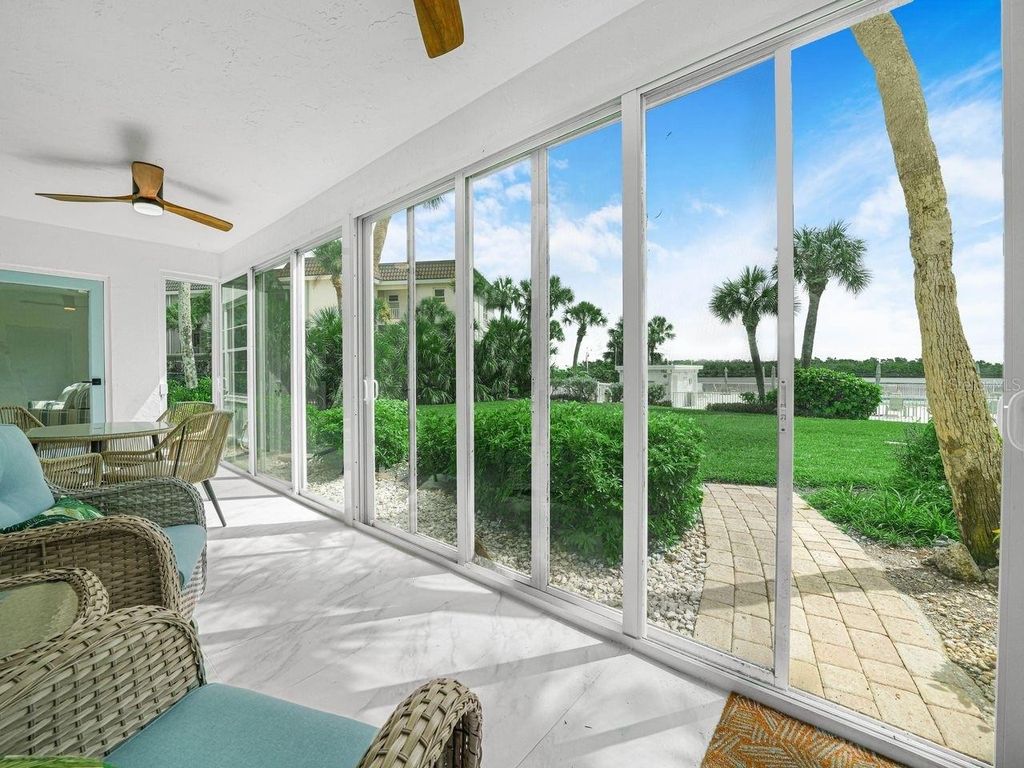 Photo of 605 Sutton Place #101, Longboat Key, FL 34228 (MLS # P4935568)