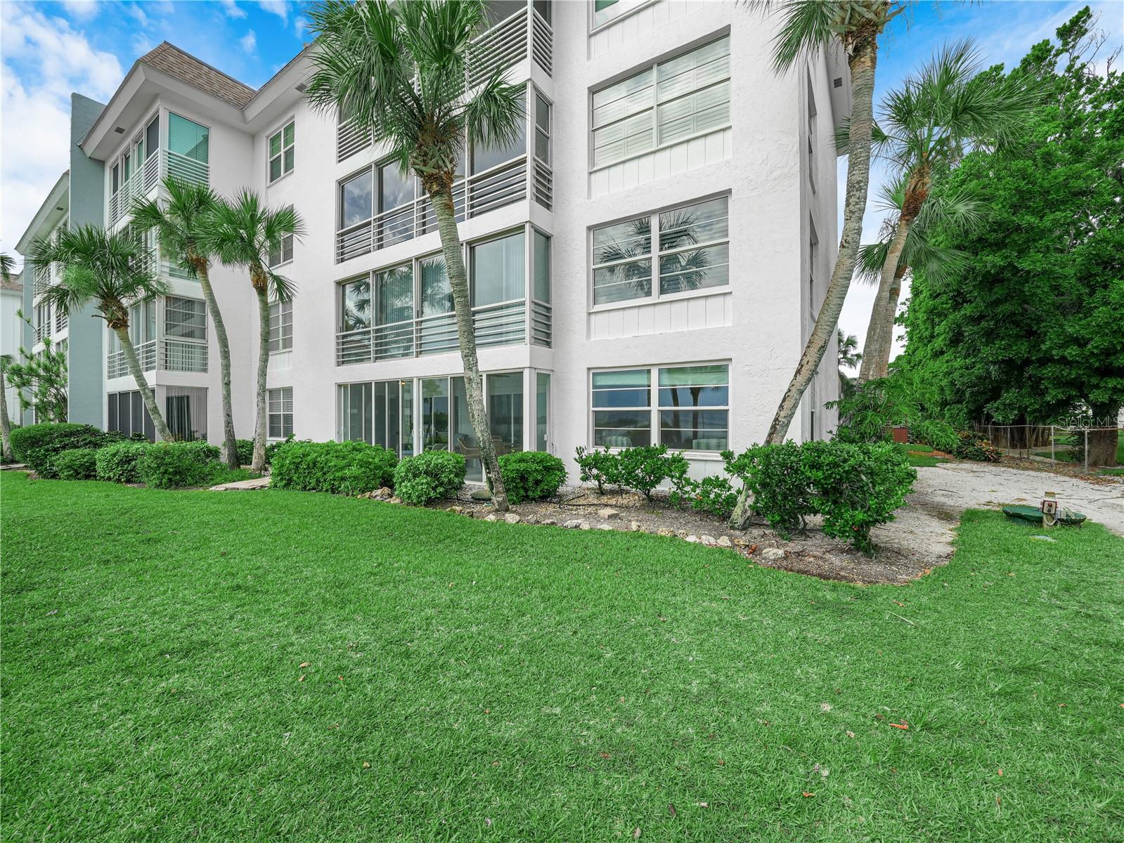 Live the Waterfront Lifestyle You’ve Been Dreaming Of Completely Remodeled Luxury Condo in Sutton Place
Welcome to this beautifully renovated, turn-key condo nestled in the highly sought after waterfront community of Sutton Place on Longboat Key. With sweeping water views from nearly every room, this 2 bedroom, 2 bath residence effortlessly blends high end finishes, modern elegance, and coastal charm.
From the moment you step inside, you’re greeted by an abundance of natural light, luxury wood and tile accents, and an open concept living space that invites you to unwind. Every inch of this home has been thoughtfully upgraded offering both comfort and sophistication.
The heart of the home is a state of the art designer kitchen featuring stunning Quartz countertops, a sleek wine bar, stainless steel appliances, luxury tile flooring, and European style soft close cabinetry. Whether you’re entertaining guests or preparing a quiet meal at home, this space is both functional and flawless.
The spacious living room boasts water views, recessed lighting, elegant wood details, and heavy duty hurricane impact sliding glass doors that lead to your screened in patio. From here, step directly onto a serene, private greenbelt area with breathtaking open bay views perfect for your morning coffee or a peaceful sunset.
Retreat to the primary bedroom suite, complete with a walk-in closet outfitted with custom built in shelving. The second bedroom offers a wall to wall closet for ample storage. Both bathrooms have been impeccably updated with designer tilework, upgraded vanities, and gorgeous finishes including a soaking tub ideal for unwinding after a long day.
This home has been completely remodeled, including all new interior doors and hardware, sinks, light fixtures, fans, commodes, vanities, recessed lighting throughout, luxury flooring, closet systems and shelving, an updated water heater in 2023, and a 2018 HVAC system that is on an active maintenance plan. Energy efficient hurricane impact windows and sliders with window treatments provide privacy, protection, and peace of mind. Custom wood and tile detailing throughout adds warmth, character, and designer style to every space.
The Sutton Place community offers unparalleled amenities including a private beach club exclusively for residents, two sparkling community pools (one recently resurfaced), an onsite marina with boat slips for only $300 annually r, a clubhouse, kayak storage, and beautifully maintained grounds. Your assigned covered parking space is located directly in front of the unit for added convenience.
The community has recently undergone significant updates, including new paint, new roofs, a resurfaced pool, passed milestone inspection with a full 10-year certification and best of all, all assessments have been paid in full by the seller.
Ideally located just minutes away from the world famous St. Armands Circle, this condo places you at the center of everything award-winning dining, boutique shopping, entertainment, pristine Gulf beaches, and everything Sarasota and Longboat Key provides.
Whether you’re looking for a full time residence, vacation getaway, or a highly desirable investment property, this home checks every box.
Location, luxury, lifestyle this one truly has it all. Schedule your private showing today and experience the dream of coastal living.