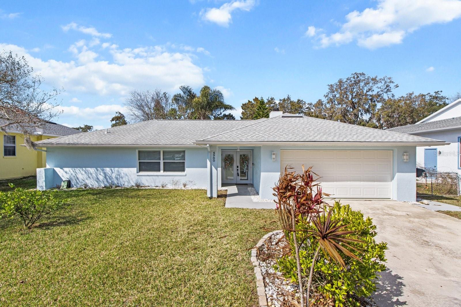 MOVE IN READY HOME! ALL PHOTOS ARE POST HURRICANE! Welcome to your new waterfront paradise nestled in the lovely community of River Haven Village, situated on the banks of the Homosassa River. With this beautiful property you will have direct access to the Gulf of Mexico, making this a boater's dream come true. The boat lift and dock in your own backyard gives you freedom at your fingertips to explore the open waters while fishing, snorkeling, swimming with manatees, paddle boarding, or cruising the coastline. This 3-bedroom, 2-bath home offers 1,898 square feet of beautiful living space and an impressive 80 feet of canal frontage with direct access to the Gulf of Mexico. Upon stepping inside you discover ceramic tile and luxury vinyl flooring throughout with a stone indoor fireplace for those chilly evenings. This newly remodeled kitchen with solid wood cabinetry, stone countertops, and large windows will help you to enjoy the Florida outdoors even when inside the comforts of your home. This tastefully finished, open-concept, spacious layout is perfect for entertaining with its abundance of natural light. The large master suite features a spacious and newly updated master bath as well as a sizeable walk-in closet with built in cabinetry. When outdoors you may unwind in your private oasis featuring a large covered screened epoxy floored lanai, as well as an open patio for entertaining family and friends. The beautiful, lush backyard, relaxing dock space, canal waterfront, and natural surroundings, all help create this peaceful retreat. The rear shed located in the back yard could be used as an additional storage space for your boating and fishing equipment or could be used as a personal workshop. The 2-car garage with built in cabinets adds the convenience of plenty of extra storage space. This home is truly a rare find in a premier location making this an ideal place for those seeking a luxurious water-oriented lifestyle. Don’t miss this incredible opportunity! This property had some water intrusion from hurricane Helene, but all repairs have been expertly completed. Don't miss the chance to own this exceptional piece of Florida real estate where you can savor the beauty of the Homosassa waterways from your own backyard.