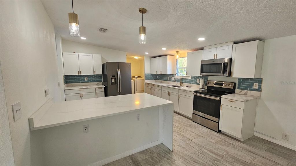 Photo of 12208 Glenhill Drive, Riverview, FL 33569 (MLS # TB8433506)