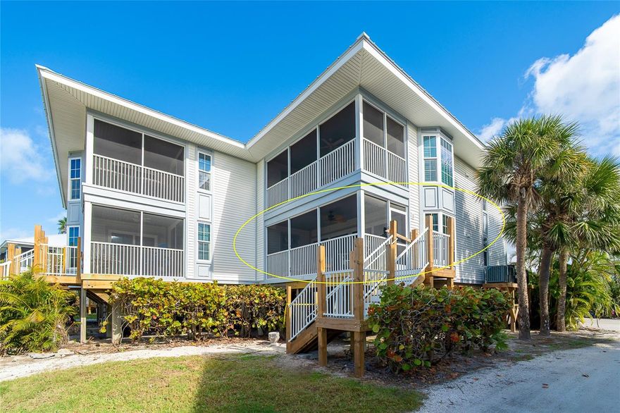 Enjoy serene island living with picturesque views just beyond your doorstep. This inviting coastal retreat features a bright, well-appointed kitchen with crisp white cabinetry, ample counter space, and a full complement of appliances—perfect for effortless everyday living or hosting guests. The open pass-through design connects seamlessly to the living and dining areas, enhancing the light, airy feel throughout. Upgraded wood panel doors are featured throughout, even on the laundry closet. Washer and dryer are new. Tiled throughout for ease of cleaning. Enjoy the screened porch all in comfort with the sea breezes blowing in. Step outside to take in the beautiful swaying palms and winding paths that lead directly toward the Gulf.  Just moments away, you’ll find 7 miles of pristine sandy beach and sparkling blue waters, offering the ultimate backdrop for relaxation. Located within an exclusive island community accessible by ferry or private boat, this property provides a peaceful, away-from-it-all setting while still offering resort-style amenities including community pool, on site dining, a vibrant tennis and pickle ball program, fitness room and classes plus a calendar of other activities. Located between Ft. Myers and Sarasota a commute from a few area airports is convenient, TPA, RSW, RGD, SRQ and PIE too. This property captures the essence of Southwest Florida coastal living.