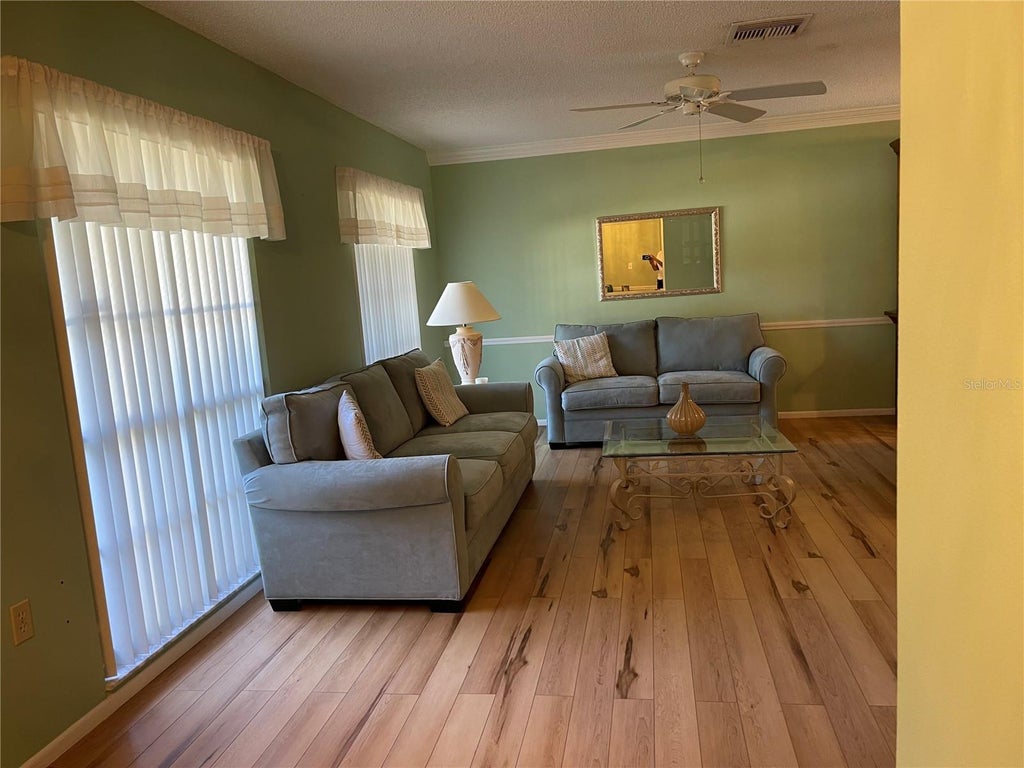 Photo of 12935 Pebble Beach Circle, Hudson, FL 34667 (MLS # TB8560533)