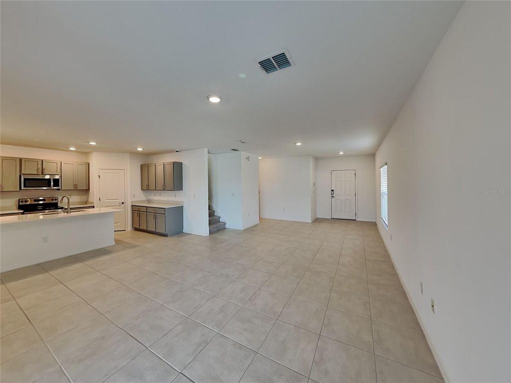 Photo of 76 Citrine Loop, Kissimmee, FL 34758 (MLS # O6378215)