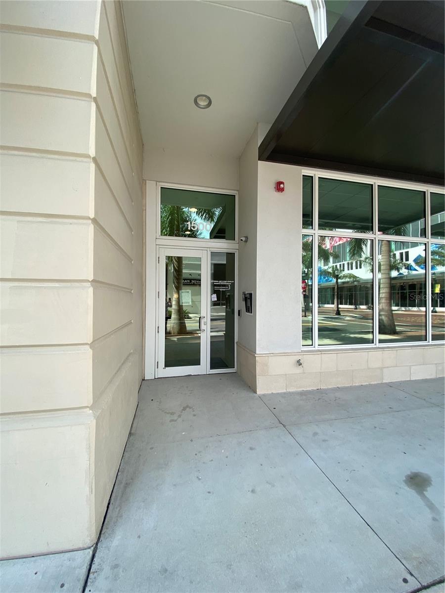 Refined Urban Living in the Heart of Downtown Sarasota. Discover the city living in this impeccably designed, fully furnished condominium located within a boutique mid-rise in downtown Sarasota. Completed in 2018, this exclusive building comprises only 20 residences, offering a private and elevated living experience. This rare corner unit is one of just four featuring the largest available floor plan, encompassing two bedrooms and two full bathrooms. The open-concept layout is enhanced by soaring 10-foot ceilings, creating a light-filled, spacious environment ideal for both relaxing and entertaining. Step onto the expansive 5' x 32' private terrace to enjoy sweeping views of Sarasota’s vibrant Main Street. The gourmet kitchen is thoughtfully appointed with stainless steel appliances, granite countertops, and a substantial island with a breakfast bar, blending functionality with contemporary style. A discreet utility closet houses a convenient stackable washer and dryer. Residents benefit from a reserved parking space located just outside a private entrance on the fourth floor of the adjacent city garage. Building amenities include secure fob-controlled access to each floor, a private elevator, and a secure lobby with individual mailboxes, ensuring both privacy and peace of mind. Located mere steps from Sarasota’s renowned cultural attractions, fine dining, boutique shopping, and Whole Foods, this residence offers an exceptional Walk Score of 96—placing the very best of the city within easy reach.
This property exemplifies the perfect balance of luxury, location, and lifestyle. Contact us today to schedule your private showing.