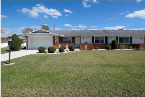 Photo of 1411 N Pebble Beach Boulevard, Sun City Center, FL 33573 (MLS # TB8545985)