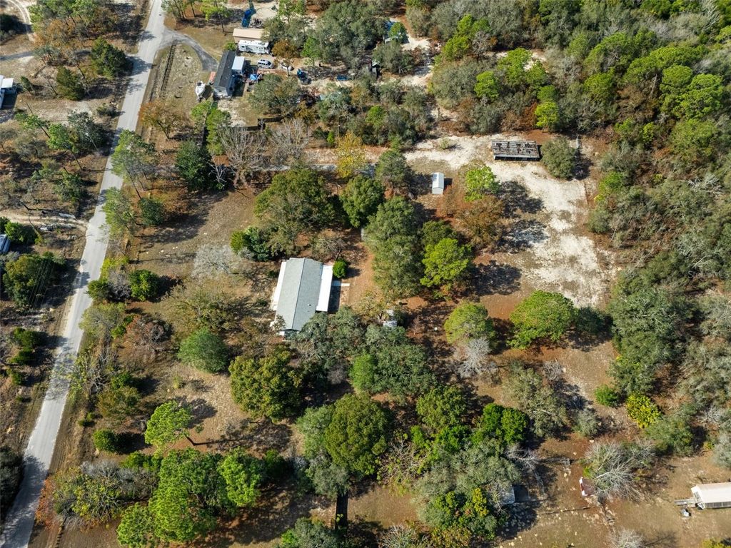 Photo of 12467 Sun Road, Brooksville, FL 34613 (MLS # TB8455453)