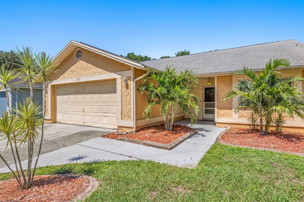 Photo of 11817 Cedarfield Drive, Riverview, FL 33579 (MLS # TB8411403)