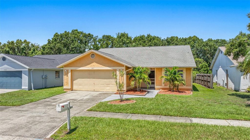 Photo of 11817 Cedarfield Drive, Riverview, FL 33579 (MLS # TB8411403)