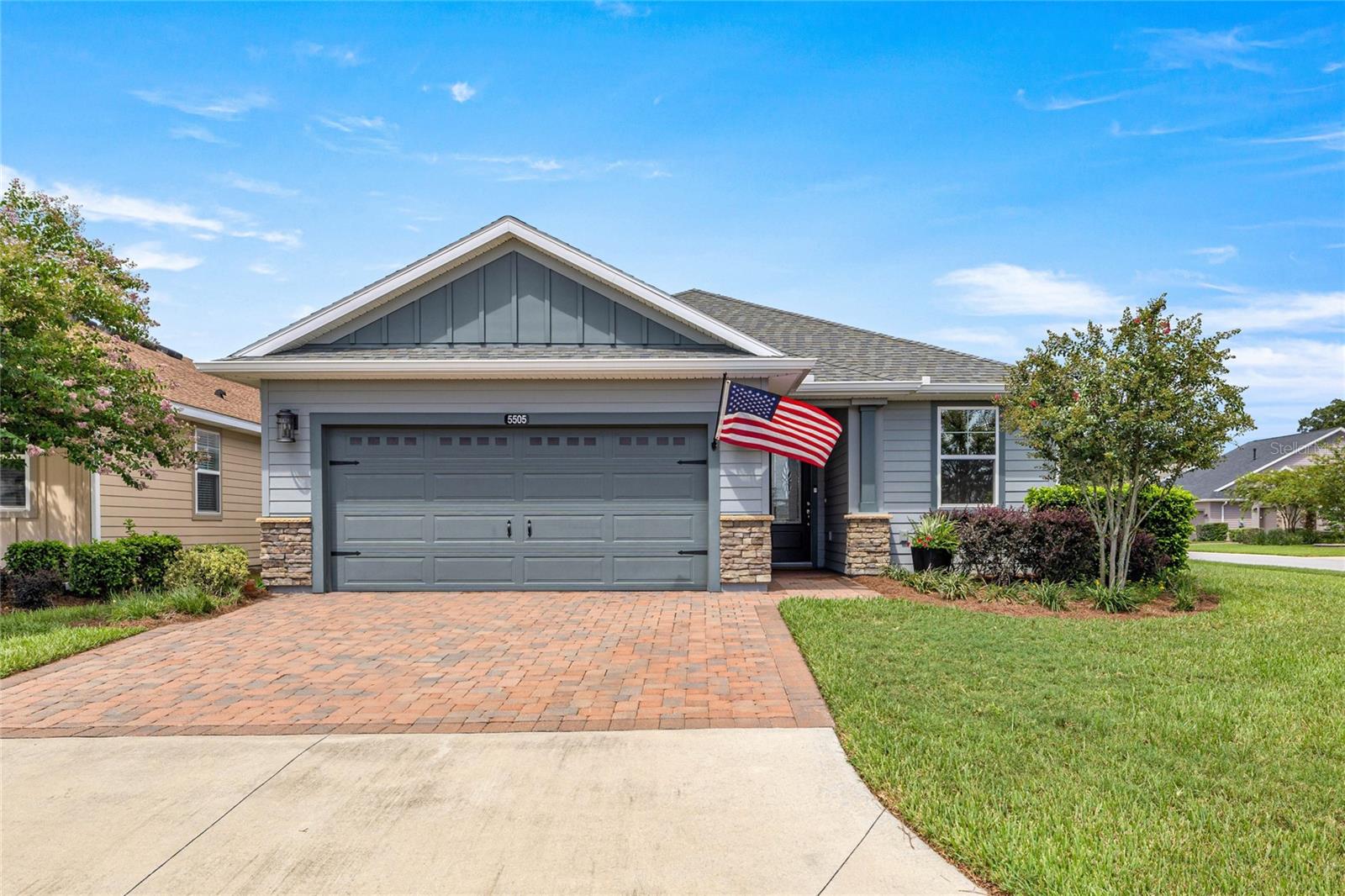Stunning MINT CONDITION home featuring 2 Bedrooms, 2 Bathrooms, plus a FLEX ROOM, situated on a LARGE CORNER LOT within the highly sought-after GATED, RESORT-STYLE golf community of Ocala Preserve. Constructed by SHEA HOMES, this ROME model blends contemporary design with energy-efficient features and access to WORLD-CLASS AMENITIES, offering an exceptional LIFESTYLE both inside and out. The OPEN FLOOR PLAN showcases VAULTED CEILINGS, ABUNDANT NATURAL LIGHT and wood-look plank-style CERAMIC TILE flooring in the main living areas. The CHEF’S KITCHEN is both functional and stylish, with TOP-OF-THE-LINE stainless steel appliances including a GAS RANGE with OUTSIDE VENTING and a DOUBLE OVEN and premium Silestone quartz counters. It also features staggered real wood cabinetry with crown molding and under-cabinet lighting, along with a generous kitchen island and pantry for ample storage. The expansive great room and dining space open directly to an OVERSIZED EXTENDED LANAI with EPOXY COATED FLOORS extending the length of the house, privacy landscaping, and a FENCED BACKYARD perfect for PETS. The primary bedroom suite features a walk-in closet, linen closet, dual vanities with quartz counters, a glass-enclosed shower, and a private water closet. With a SPLIT-BEDROOM layout, guest privacy is maximized. The FLEX ROOM, complete with double doors, is perfect as a HOME OFFICE or additional guest area. MORE HIGHLIGHTS include a laundry room with cabinetry and utility sink, high-end washer and dryer, premium ceiling fans and lighting fixtures throughout, and blinds on all windows. The SPACIOUS AIR-CONDITIONED GARAGE featuring an EPOXY FLOOR, a workshop area, and extensive storage is a true GAME CHANGER! The Ocala Preserve HOA handles lawn and landscape maintenance and irrigation, provides high speed fiber-optic internet and 24/7 gated security. Residents enjoy resort-style amenities such as a Tom-Lehman designed golf course, resort and lap pools, a spa and fitness center, tennis, pickleball and bocce courts, scenic walking and biking trails, dog parks, and a fishing dock with canoe/kayak access. The impressive Clubhouse features the Salted Brick restaurant, picturesque Lakeside Veranda & Boardwalk (on a gorgeous seven-acre lake) and there is golf cart access throughout the entire community! Located just minutes from the World Equestrian Center (WEC), this home is MOVE-IN READY and sure to impress!