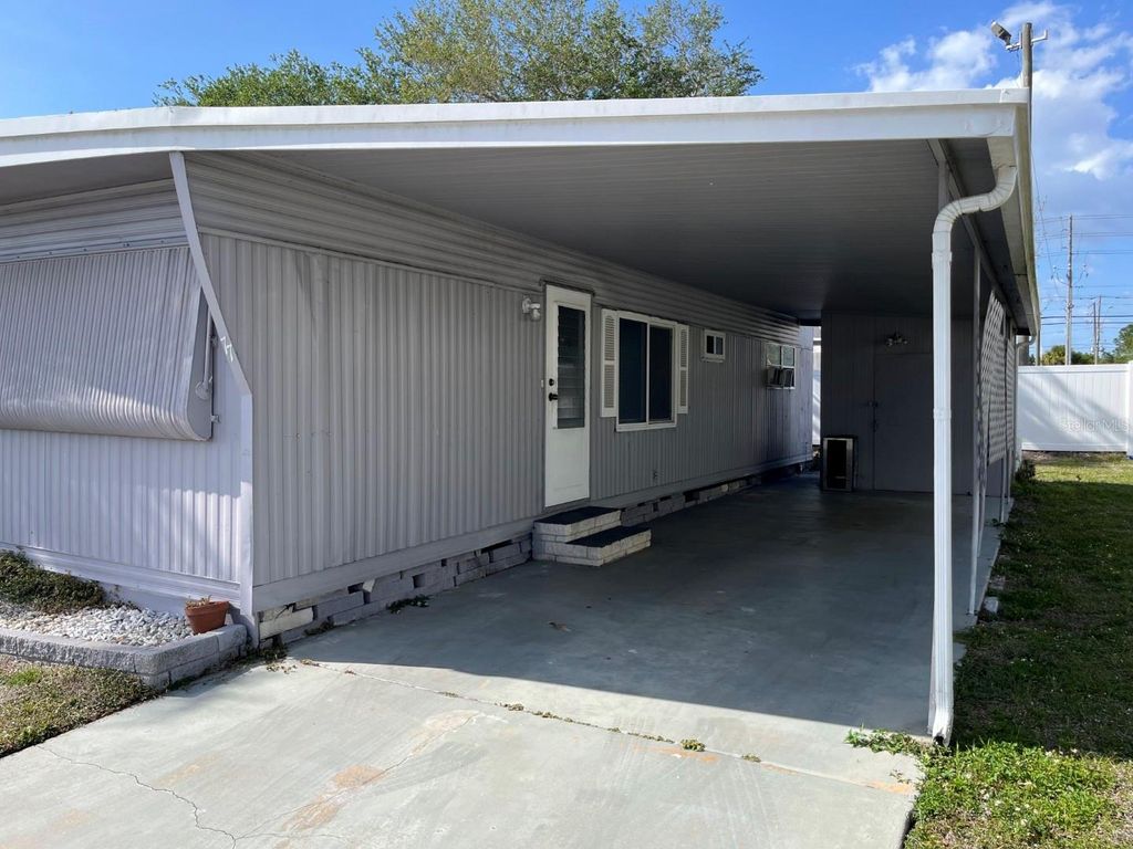 Photo of 2505 E Bay Drive #77, Largo, FL 33771 (MLS # TB8495869)