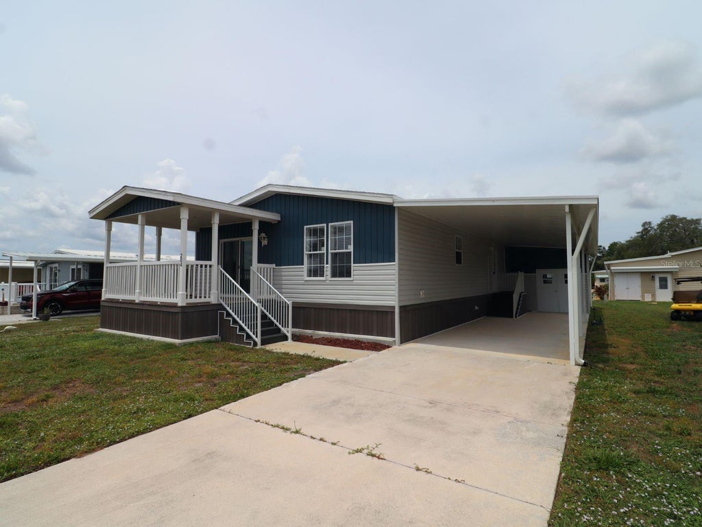 Photo of 204 El Prado Ave, North Port, FL 34287 (MLS # S5152071)