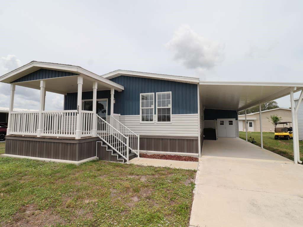 Photo of 204 El Prado Ave, North Port, FL 34287 (MLS # S5152071)