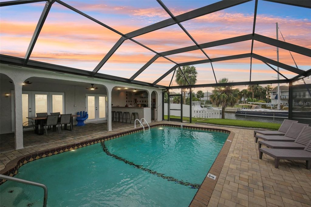 Photo of 4087 Gulf Coast Drive, Hernando Beach, FL 34607 (MLS # TB8433367)