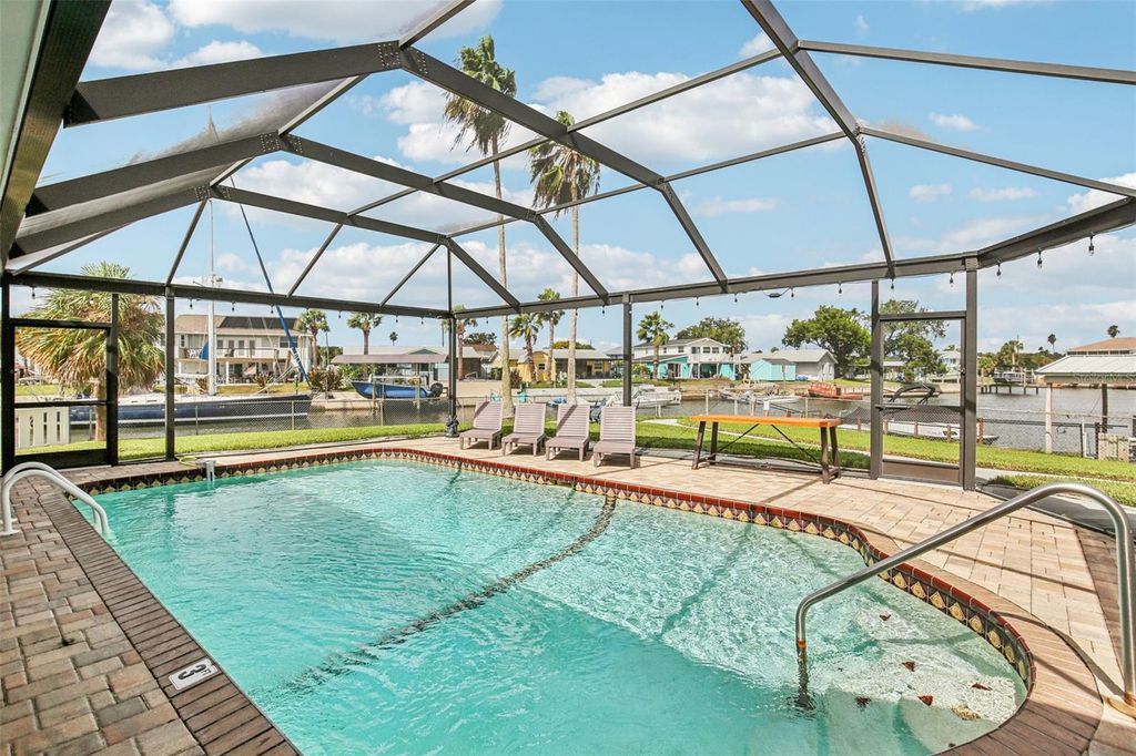 Photo of 4087 Gulf Coast Drive, Hernando Beach, FL 34607 (MLS # TB8433367)