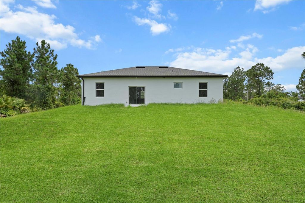 Photo of 718 Drury Avenue, Lehigh Acres, FL 33974 (MLS # A4669966)