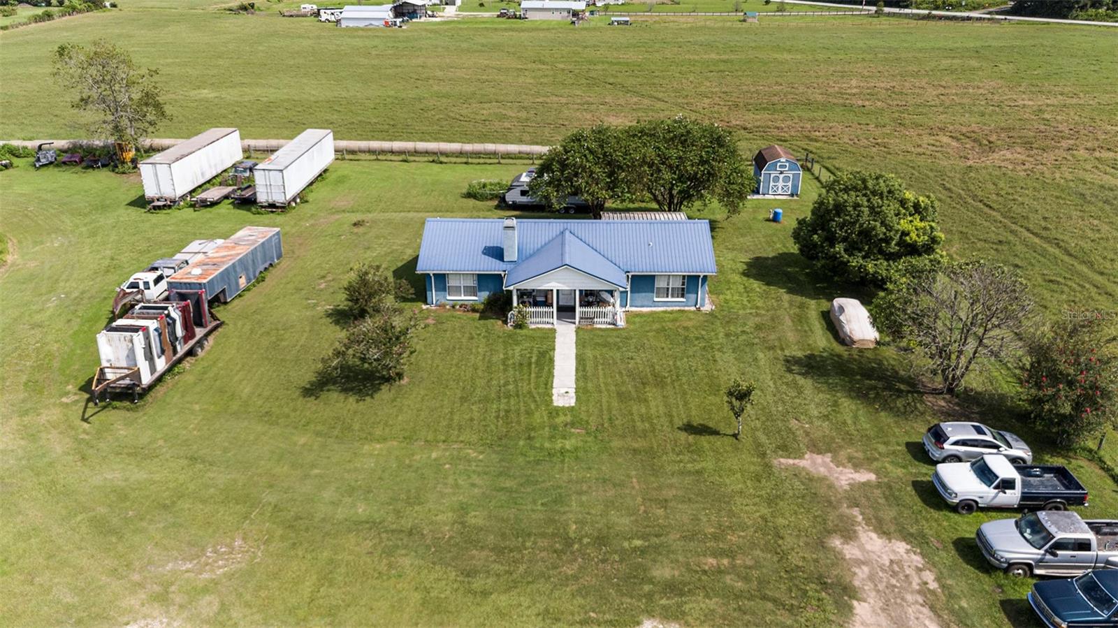 Discover the immense potential of this 3.5+ acre triple-zoned property—a rare find for investors and business owners alike. The land features an existing 3-bedroom, 2-bath home, providing immediate residential income or a convenient live/work setup. For business purposes, a large metal building offers established infrastructure, currently housing an auto repair/chop shop, but easily adaptable for your next venture. Whether you envision a profitable family compound, a live/work complex, or a high-traffic business location, this property delivers on flexibility and growth. Explore your options and invest in a property with truly limitless possibilities.