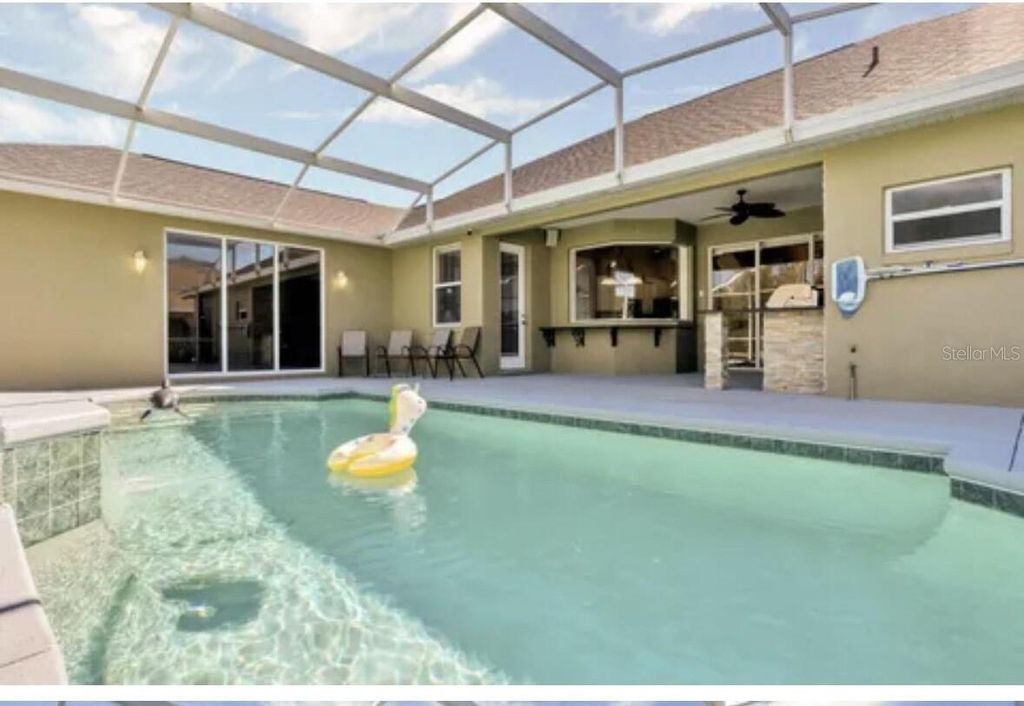 Photo of 445 Talamone Drive, Winter Haven, FL 33884 (MLS # O6402151)