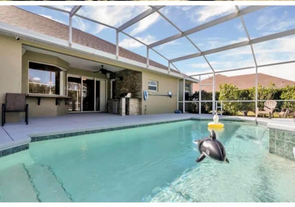 Photo of 445 Talamone Drive, Winter Haven, FL 33884 (MLS # O6402151)