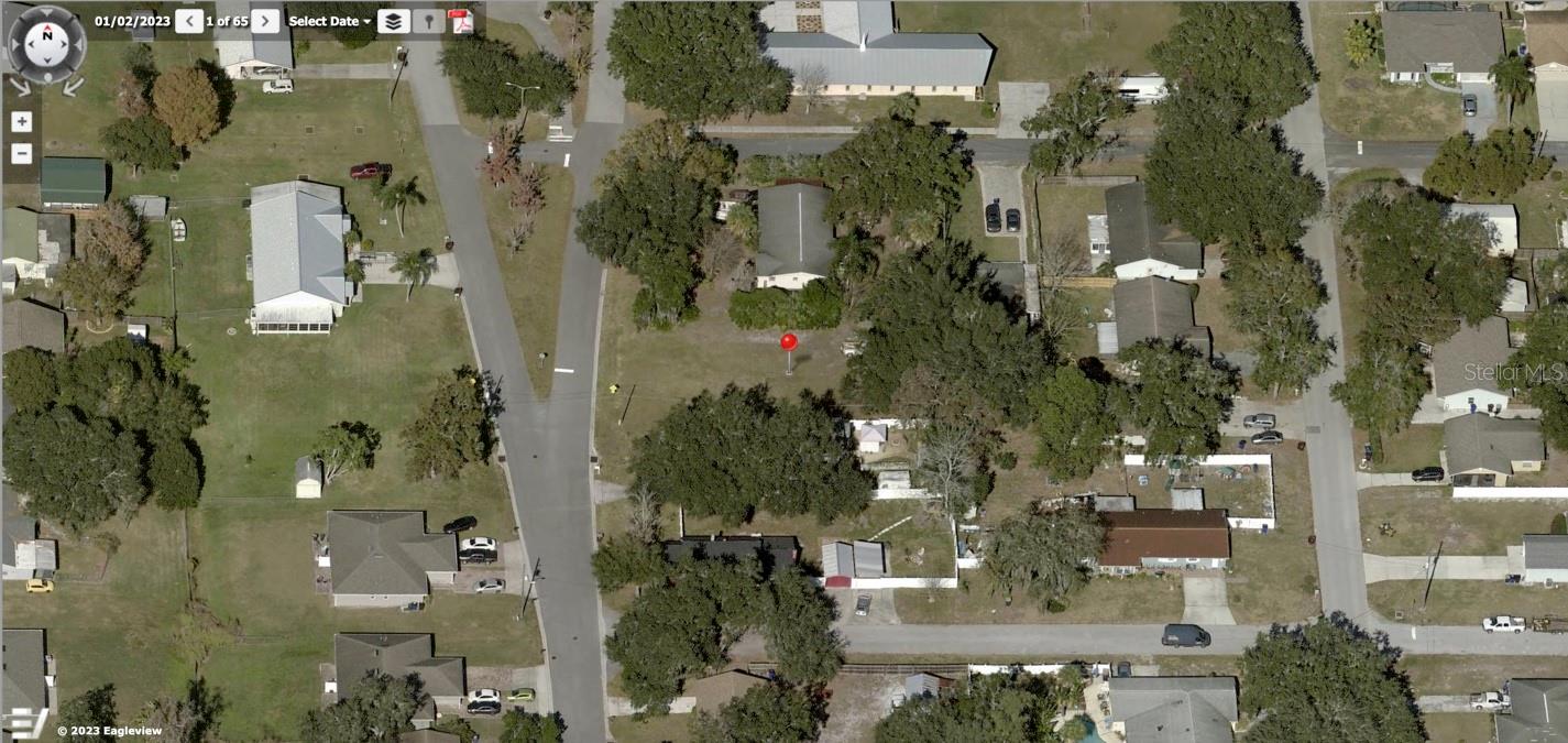 The city lakefront is 1/2 mile from this vacant lot. The public Marina is less than 2 miles away. There are 12 boat tie-outs at the boat basin. The lot faces a well-lit walking/bike path that leads to Lake Tohopokaliga. Lake Toho connects to both Lake Runnymede and Boggy Creek. Wide sidewalks with many benches ring the lake perimeter. Fishing is allowed from the lake edge and there is a fishing pier adjacent to the Marina. The Marina features a restaurant, restroom facilities, and a sandy beach. Covered picnic tables and grills are available.