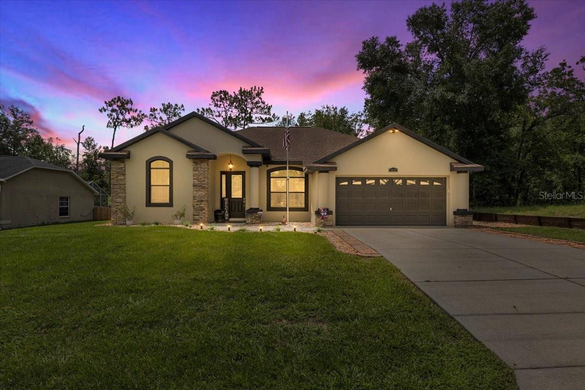 ***Seller is offering UP TO $7,000 in closing costs*** Welcome to Florida living in this exquisitely updated luxury residence nestled in the heart of Citrus Springs. This stunning three-bedroom, two-bath home boasts 10-foot ceilings and grand 8-foot doors.
Step inside to discover all-new flooring, rich quartz countertops, and freshly painted interiors that blend modern elegance with everyday comfort. The lavish master suite is complete with dual walk-in closets and a spa-inspired en suite bath. There is a sliding door from the master suite leading directly to the pool.
Outdoor living is elevated with a sparkling saltwater pool surrounded by a private fence—ideal for serene afternoons or elegant entertaining. A charming boardwalk leads to a cozy outdoor fireplace, the perfect backdrop for evening gatherings or after work relaxation.
Every detail in this home reflects quality and care. If you’re seeking a move-in-ready oasis with upscale finishes and resort-style amenities, this is where your next chapter begins.