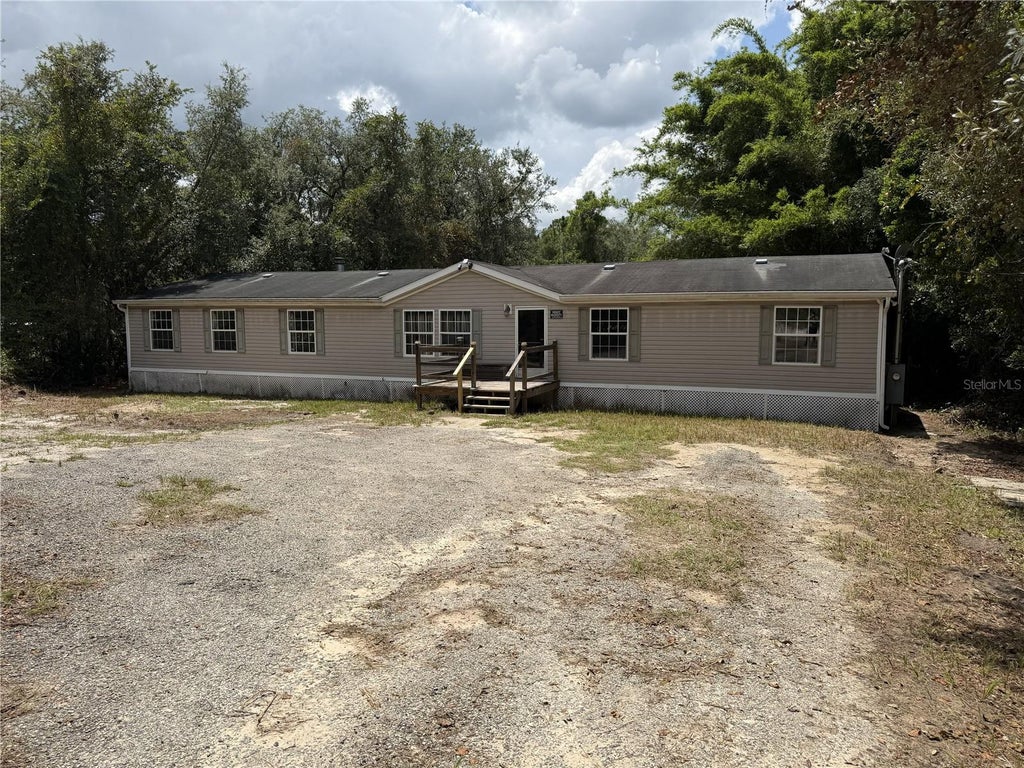 Photo of 41527 Paradise Road, Deland, FL 32720 (MLS # O6432113)