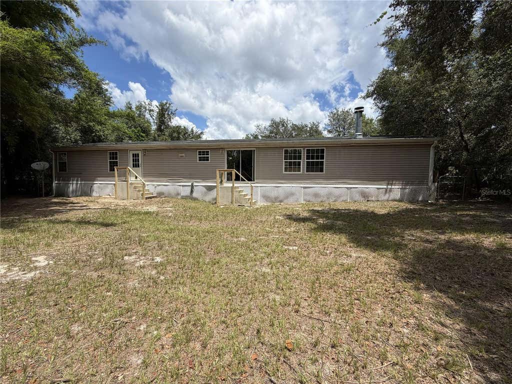 Photo of 41527 Paradise Road, Deland, FL 32720 (MLS # O6432113)