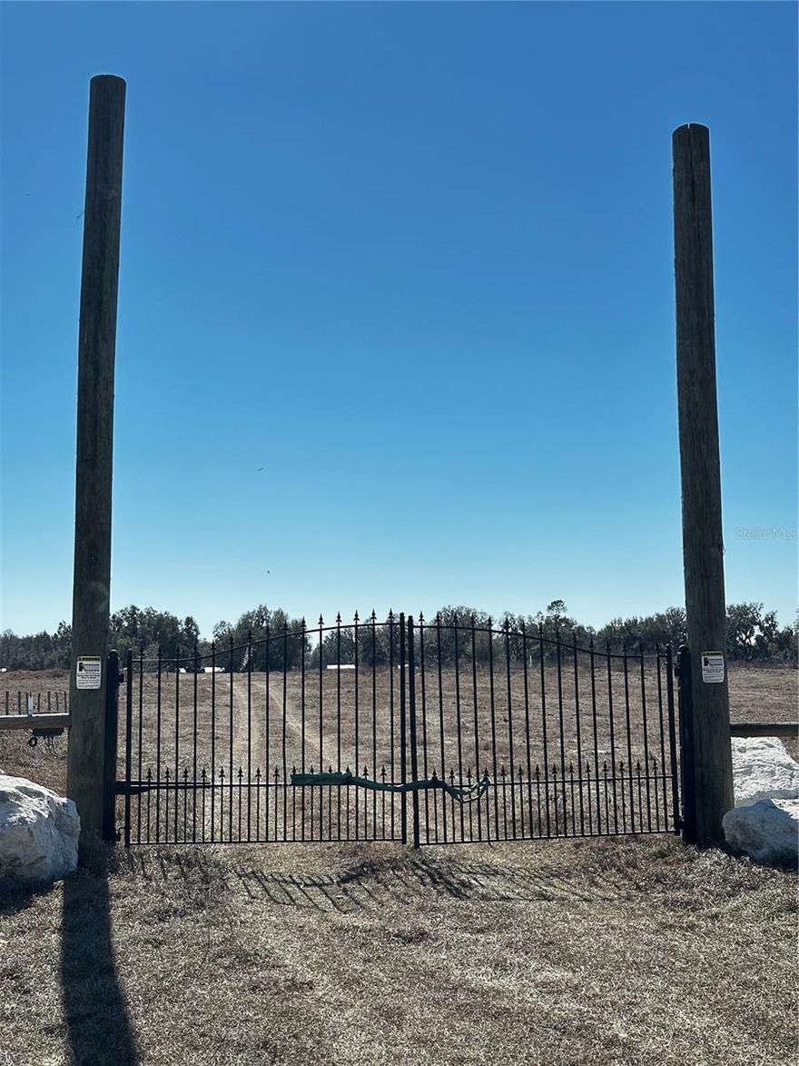 Beautiful 10.04 Acres totally fenced with gated access fronting county road 707. Property lays flat to rolling 330 feet road frontage and 1330 feet deep with a live stock pond. Their is a 50 ft X 120 ft building slab/foundation with rough plumbing for a 5 bedroom with den, 3 1/2 bathroom 4,000 sq. ft. metal Barndominium home and an attached 2000 sq.ft. Garage. Owner would be willing to negotiate the Barndominium kit including windows and doors if the floor plan and layout work for the buyer. Survey available.