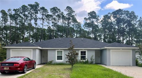 Photo of 39 Underwood Trail, Palm Coast, FL 32164 (MLS # R4909856)