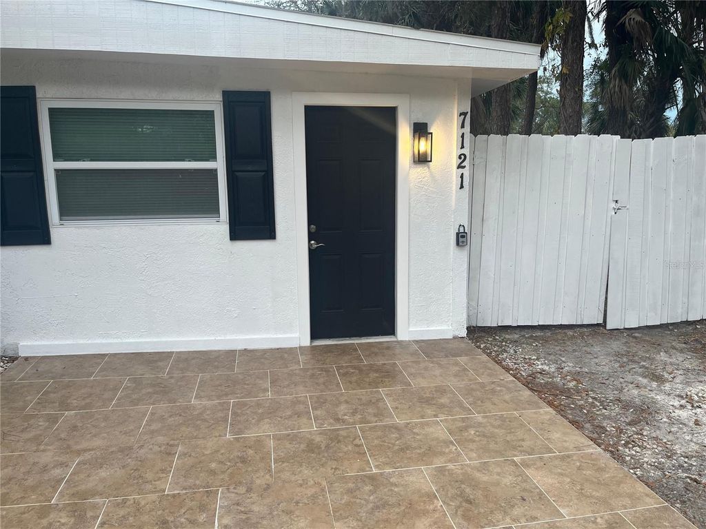 Photo of 7119 Oakwood Dr, New Port Richey, FL 34652 (MLS # TB8477475)