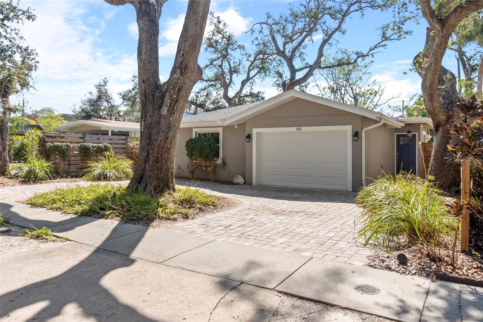 MASSIVE Price Improvement! INCREDIBLE VALUE WEST of the TRAIL!! Don't miss the opportunity to own this fully renovated, turnkey bungalow style, FL home in Sarasota's most desireable and highly sought after Cherokee Park - "West of the Trail". This home has been meticulously updated with every detail considered, offers a natural surround. On quiet, peaceful, Wisconsin Lane, you feel like you've stepped back in time to Old Florida with the canopy-tree lined street and historic homes. Within 10 minutes (or less) everything you could dream of - Siesta Key Beaches (best beach in the world), Sarasota Memorial Hospital (yes - for you Dr's with on call schedules) highest rated schools, shopping, dining, entertainment, marina, theater, museums, airport (about 20 minutes). This home offers so much privacy, open floor plan living and flexibility. The home features an indoor laundry room, a hard wired generator hook-up (Hurricane Impact Windows & Doors &&& NO FLOODING HERE in any of the 2024 hurricanes), an oversized garage (1.5 car) with epoxy floors and split unit AC for a home gym, home office, home school, playroom - the possibilities are endless AND in the PERFECT LOCATION!! If you need a biggeer home - YOU CAN BUILD UP and double your living space. Short term rental/lease is permitted. All plumbing and electrical new in 2017/2018, Roof replaced - 2017, HVAC - 1 YEAR w/9 Year Warranty, Bosch Range - 2 Years Old, Bosch Dishwasher - 3 years Old, Washer & Dryer Convey.