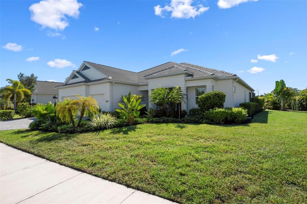Photo of 104 N Cayman Isles Boulevard, Englewood, FL 34223 (MLS # N6146325)