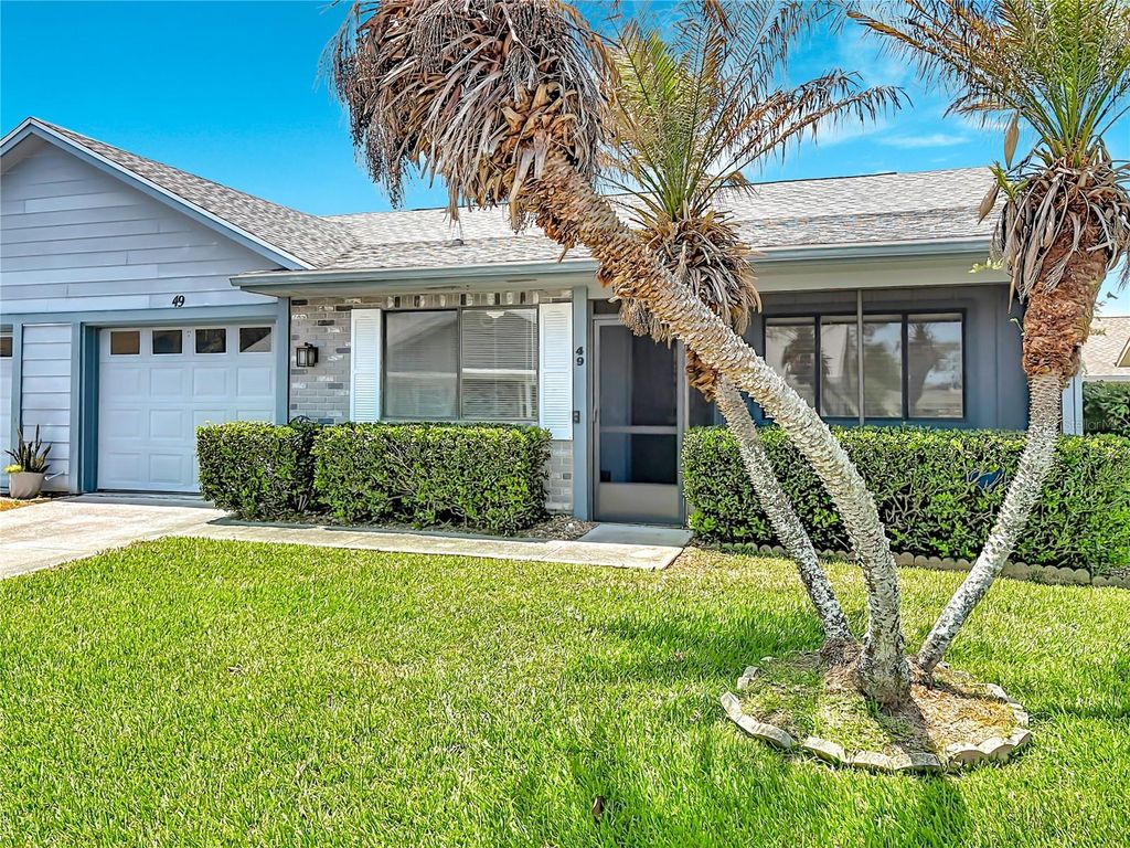 Photo of 49 Bogey Circle, New Smyrna Beach, FL 32168 (MLS # G5111516)